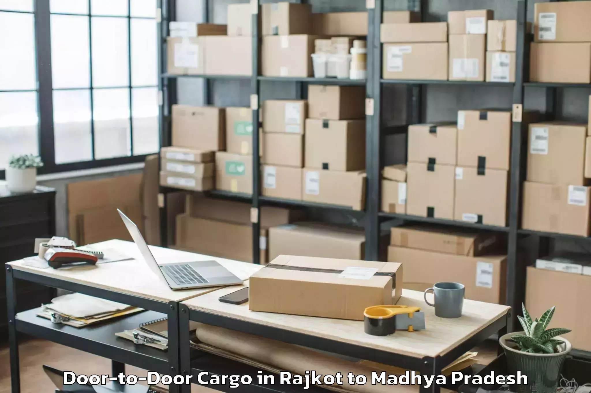 Leading Rajkot to Baldeogarh Door To Door Cargo Provider